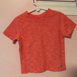 Toddler boys salmon colored v-neck tee.